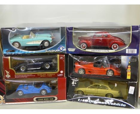 Six 1/18 scale die-cast model vehicles including Solido and Motor Max Ford Coupe, boxed 