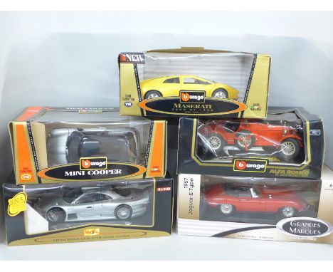 Five 1/18 scale die-cast model vehicles, Maisto, Burago and Ertl 