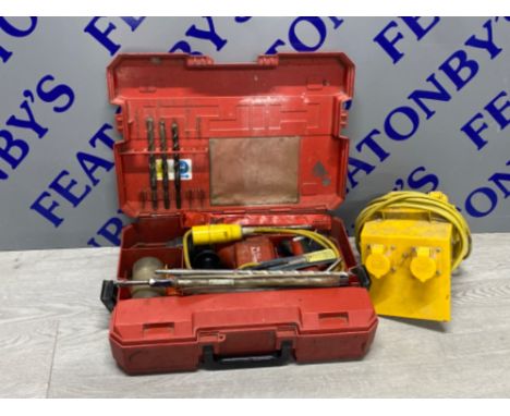 A Hilti TE 14 hammer drill with accessories and drill parts also includes transformer