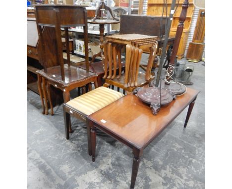 Reproduction mahogany coffee table, a dressing table stool with upholstered top, a nest of three tables, an oak sewing table 