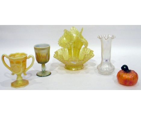 Yellow carnival glass epergne, the circular wavy-rimmed bowl fitted with three removable trumpets, a carnival glass model of 