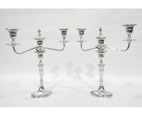 Pair of Georgian style silver plate two-light candelabra of typical form.