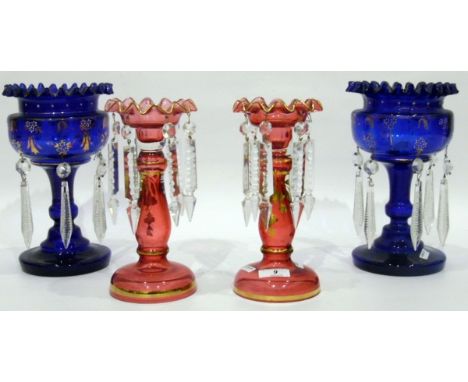 Pair of Victorian blue glass lustres, the central vases with gilt and enamel decoration, hung with moulded glass lustre drops