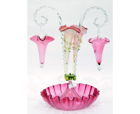 Victorian cranberry glass epergne, the circular cranberry base with frilled edges and fitted with two cranberry hanging glass