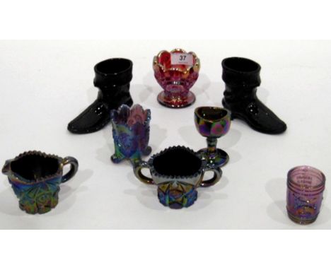 Collection of carnival glass and other items including a pair of black pressed glass models of boots, an amethyst carnival gl