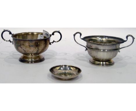 Silver two-handled sugar basin, circular with beaded border, with scroll handles, on beaded foot, Birmingham 1930, another Ma