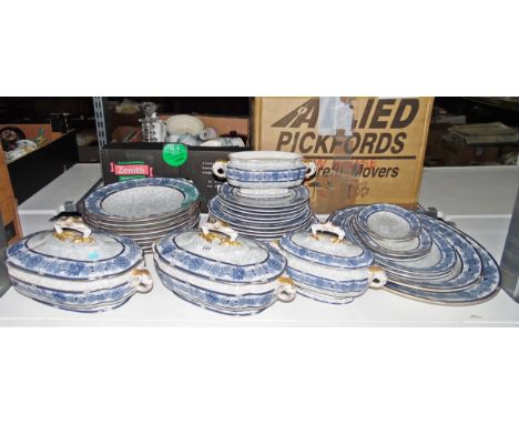 Royal Worcester part dinner service, No.RdNo42321, blue ground, gilt highlighted and floral decorated 