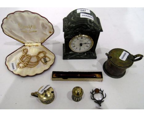 Aynsley mantel clock in green and white marbled case decorated with peacocks, a Parker fountain pen in red case, a model of a