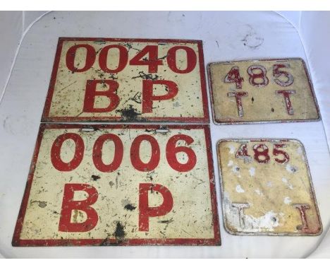 Two BP refinery/tanker plaques and two others, both marked 485TT.
