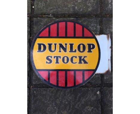 A Dunlop Stock circular double sided enamel sign with hanging flange, in good condition.