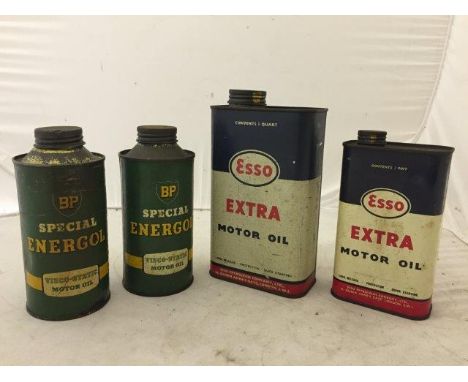 Two Esso Extra Motor Oil cans, and two BP Energol oil cans.