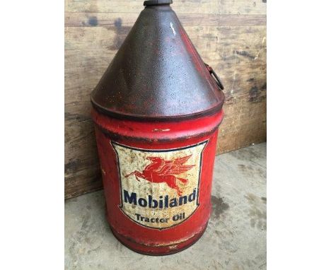 A Mobiland Tractor Oil cylindrical five gallon can.