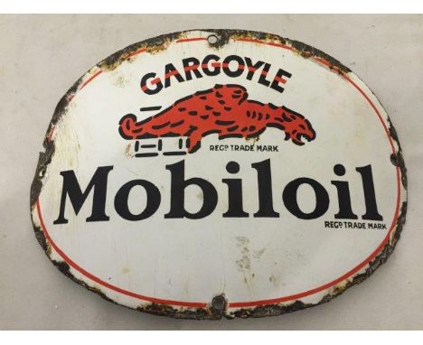 A Mobiloil oval convex cabinet enamel sign, 11 1/2 x 8".