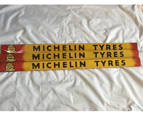 A set of three Michelin Tyres shelf strips.