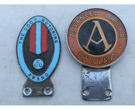 An Advanced Driver First Class car badge and a 'Good Motoring Award' part enamel car badge. 