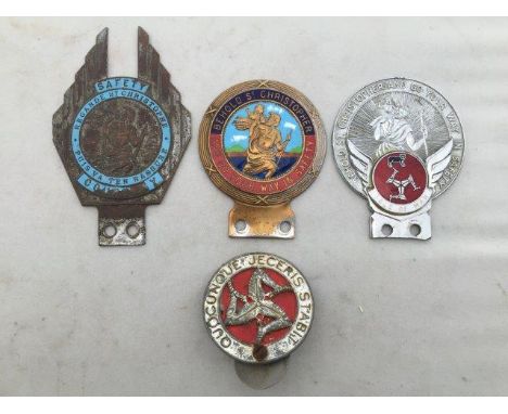 Three part enamel St. Christopher car badges and a Gilbert Harding Limited Douglas circular Isle of Man badge. 