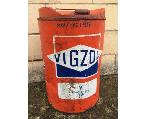 A Vigzol Tractor Oil five gallon can. 