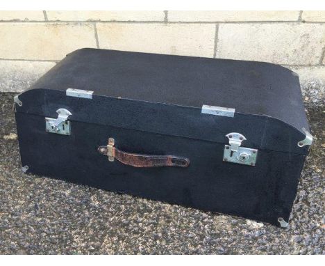 A sloping fronted car trunk.