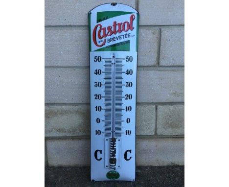 A French Castrol convex enamel thermometer in good condition, 7 1/2 x 30".