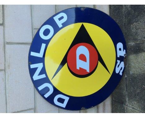 A Dunlop SP circular enamel sign, 27 1/2" diameter.