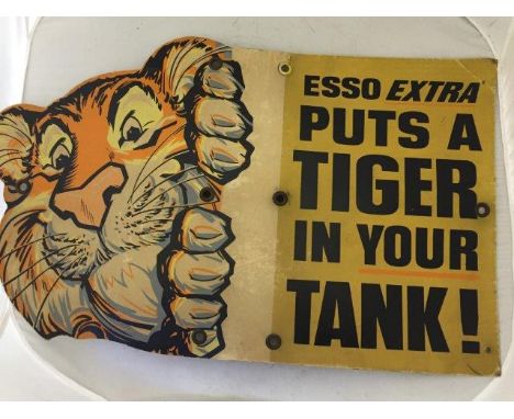 An Esso Extra 'Puts a tiger in your tank' part pictorial cardboard advertising sign, 28 1/2 x 17 1/2".