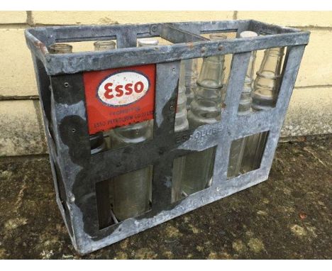 An Esso 12 bottle crate containing 12 Essolube oil bottles.