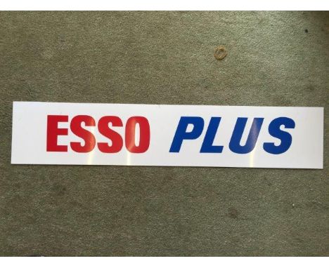 A pair of original new old stock Esso Plus plastic petrol pump panel signs.