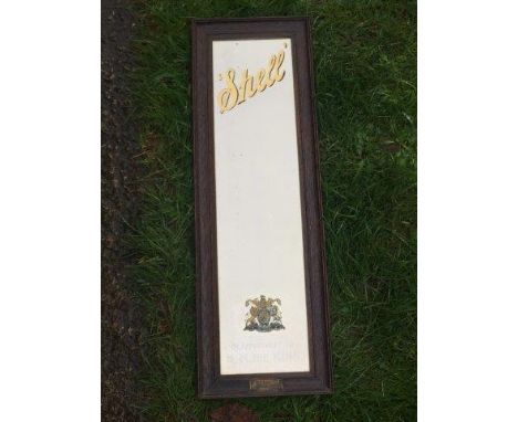 An early Shell narrow advertising mirror bearing Royal crest and original plaque to the frame.