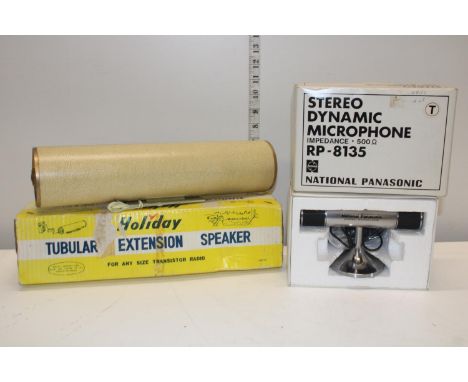 A vintage tubular extension speaker and stereo microphone 