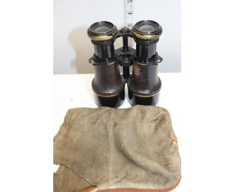 A pair of military binoculars by Heath &amp; Co. With broad arrow mark 