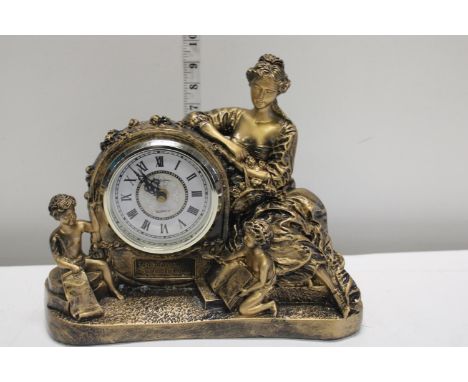 A Wellington battery powered mantle clock 