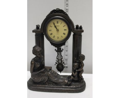 A Julianna battery powered mantle clock 