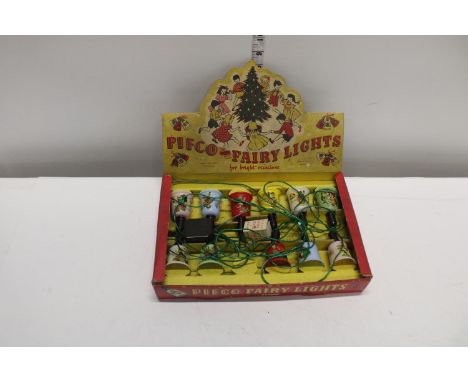 A boxed set of vintage Pifco fairy lights (one light shade missing) 