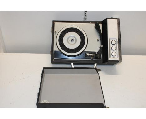 A vintage Monarch portable record player 