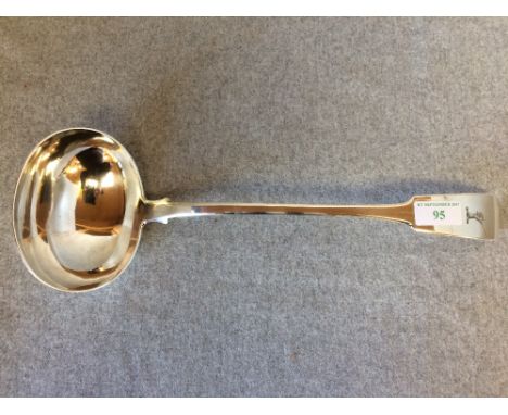 A George IV Scottish silver, fiddle pattern, soup ladle, crested, Glasgow 1830, 8 oz