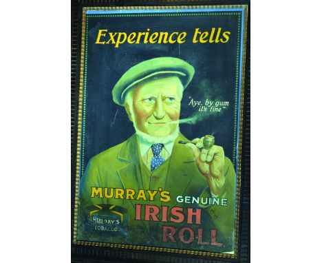 MURRAYS IRISH ROLL MULTICOLOURED FRAMED ADVERT. 30 by 22ins, flat capped gent pictured smoking pipe AYE BYGUM ITS FINE. EXPER