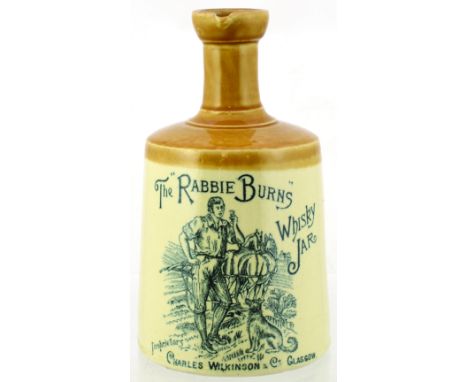 RABBIE BURNS WHISKY JUG. 7.75ins tall, tan top, lower off white glaze. Black transfer THE RABBIE BURNS WHISKY JAR with highly