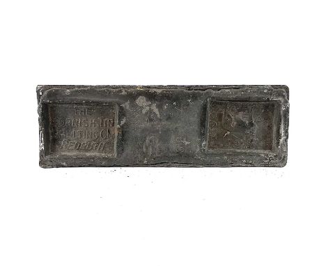 A Cornish Tin Smelting Co, Redruth, 28lb tin ingot, circa 1930's, length 36cm width 12cm. This is one of the last tin ingots 