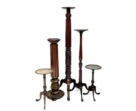 A Victorian Mahogany torchere, with fluted and carved pillar on tripod base, height 132cm, together with two further mahogany