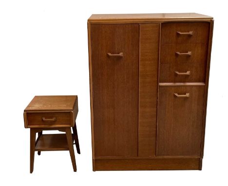 A G Plan light oak dressing chest or low compactum, with wardrobe section, a cupboard and three drawers, one fitted an adjust
