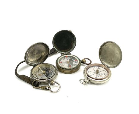 An early 20th century Short &amp; Mason brass hunters compass with a mother of pearl dial stamped S M London, diameter 4cm to