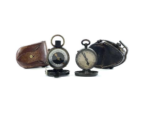 A WWI brass lacquered marching compass with mother of pearl dial by Verners E Koehn Geneve Suisse 1918 stamped with broad arr