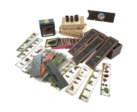 A collection of eleven painted magic lantern slides, with mahogany frames, another set of coloured slides, ten Presbury &amp;