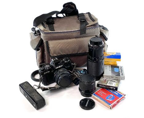 Minolta X 700 SLR camera and accessories including 24mm lens, 50mm lens, 62mm Marumi lens various filters and carry case. The