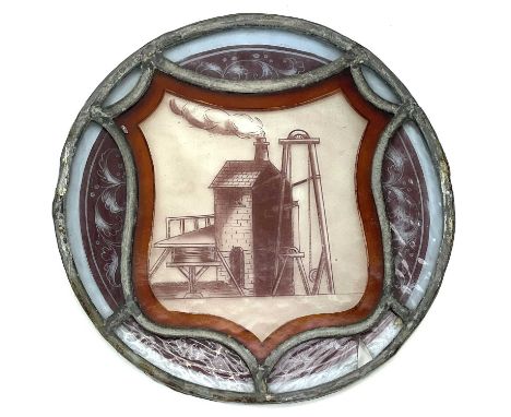 A late 19th century circular stained glass panel depicting a Cornish engine house, diameter 20cm.This large collection of ext