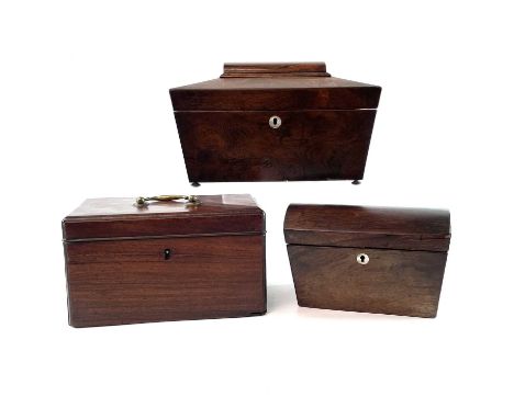 A George III mahogany triple tea caddy, with brass handle, width 24.5cm, together with two Victorian rosewood caddies (3).