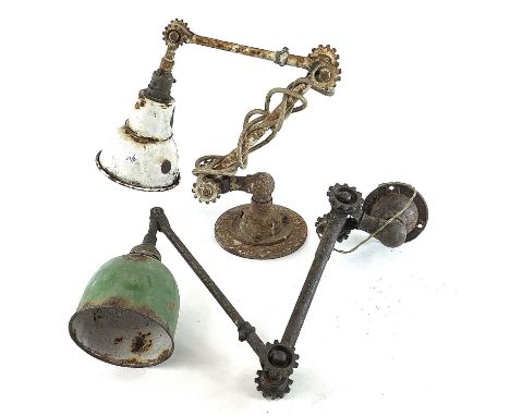 A vintage industrial wall mounted work lamp, approximate length 65cm, together with another similar lamp (2).