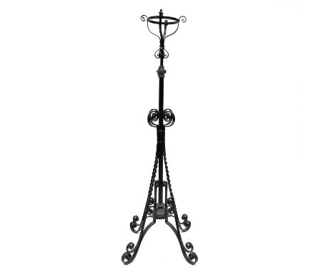 A late Victorian wrought iron telescopic oil lamp holder, with scroll and twist decoration, height 140cm.