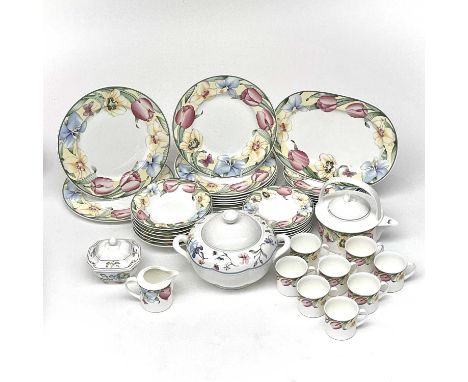 A Villeroy and Boch porcelain Canari part service comprising: teapot and cover, milk jug, eight teacups, seven side plates, s