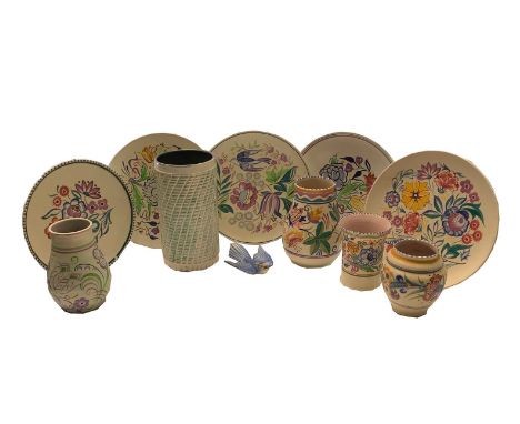 Poole pottery, comprising of a bird wall plaque, width 12cm, a vase with spiral relief chequer decoration, height 22.5cm, fou